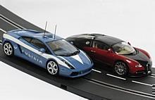 Hersteller AutoArt zeigt mit dem Bugatti und Lamborghini, dass optisch gelungene Slotcars auch in den Fahreigenschaften vorbildlich sein können.